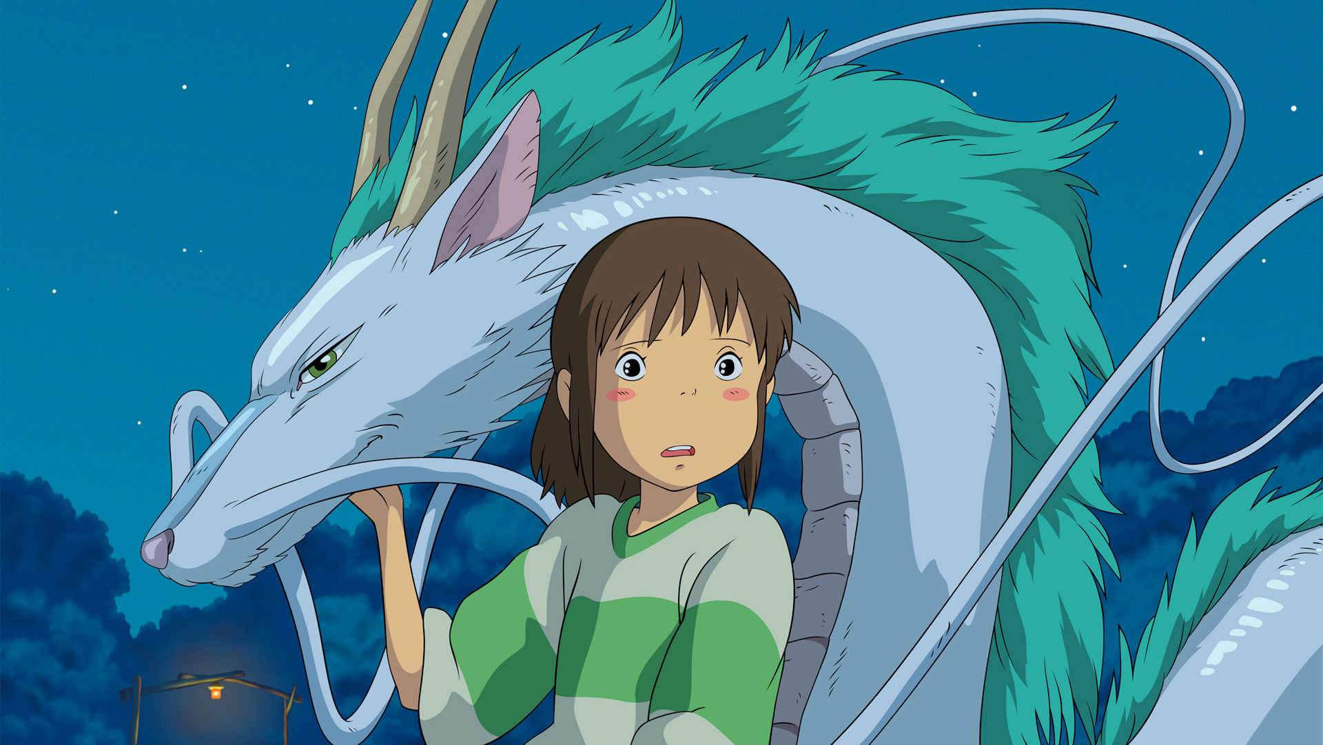 A young girl blushes while standing next to her blue dragon friend.